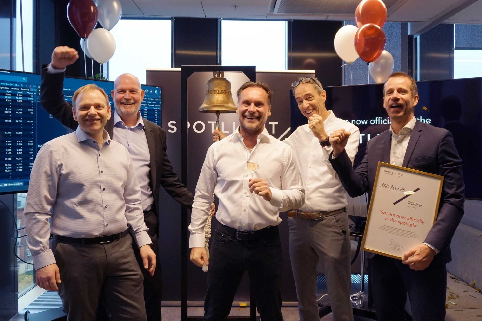 macbook pro on brown wooden table