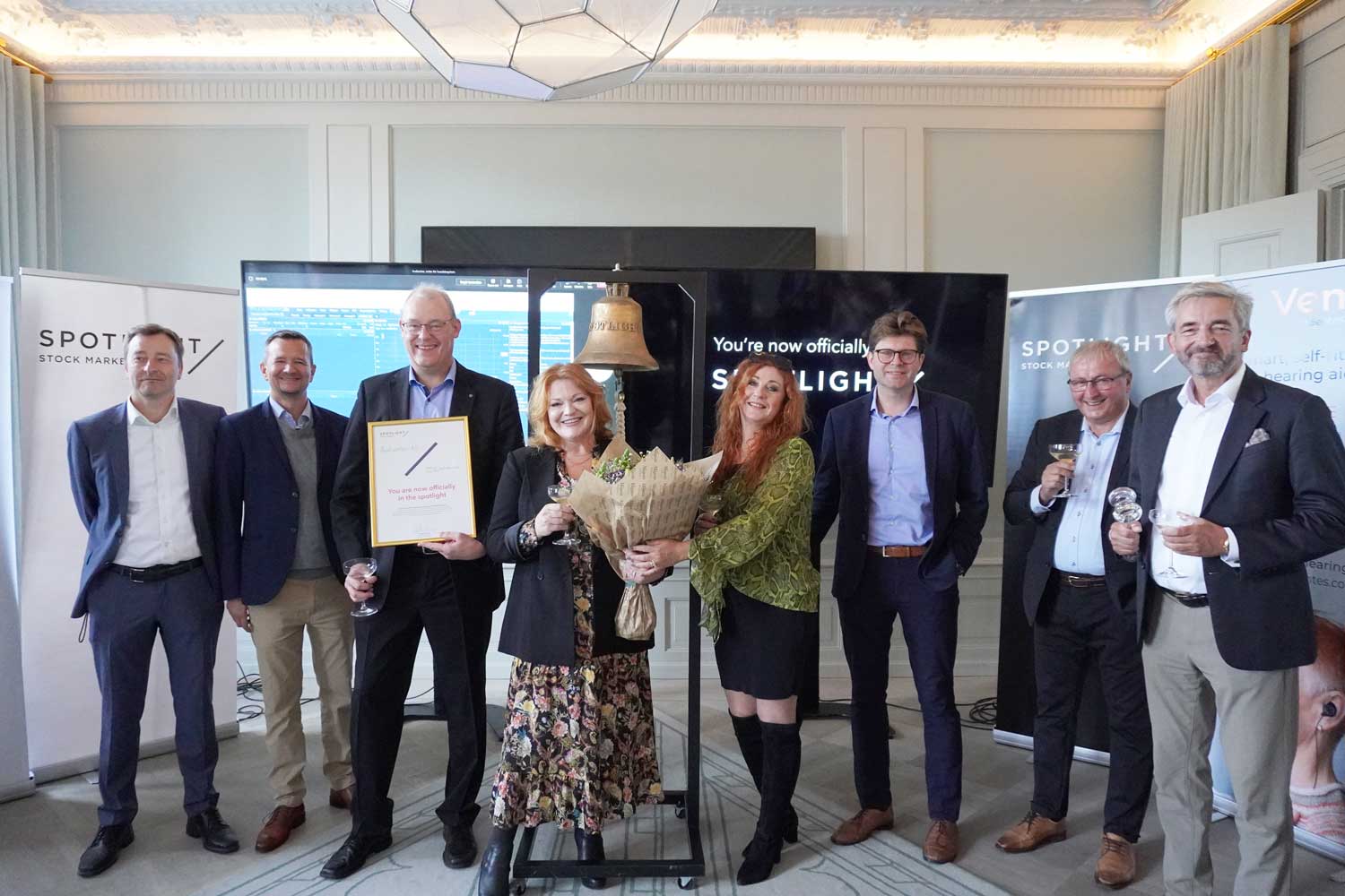 macbook pro on brown wooden table