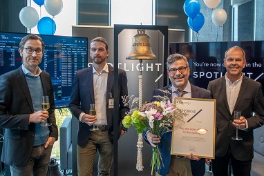 macbook pro on brown wooden table