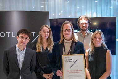 macbook pro on brown wooden table