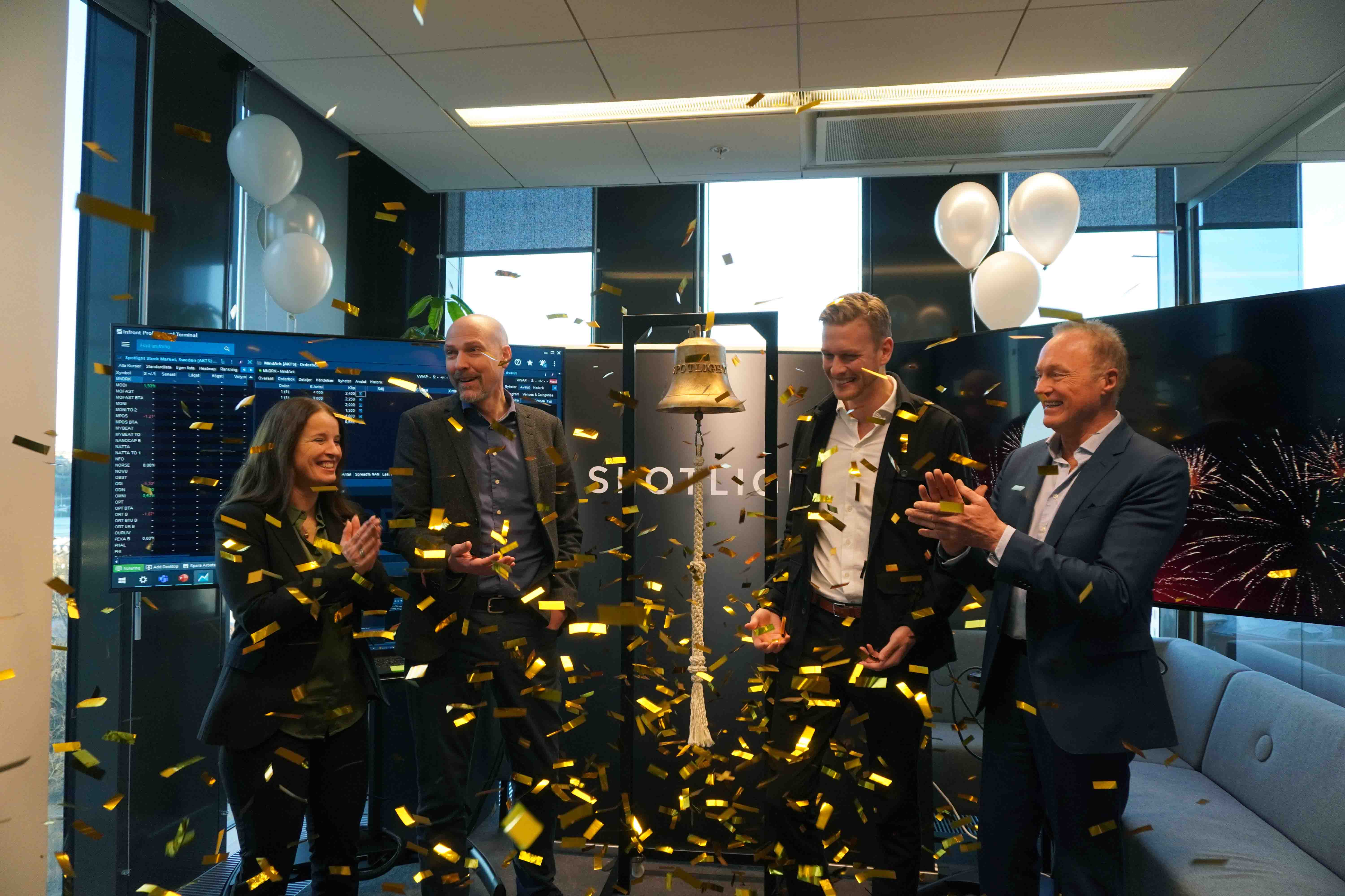macbook pro on brown wooden table