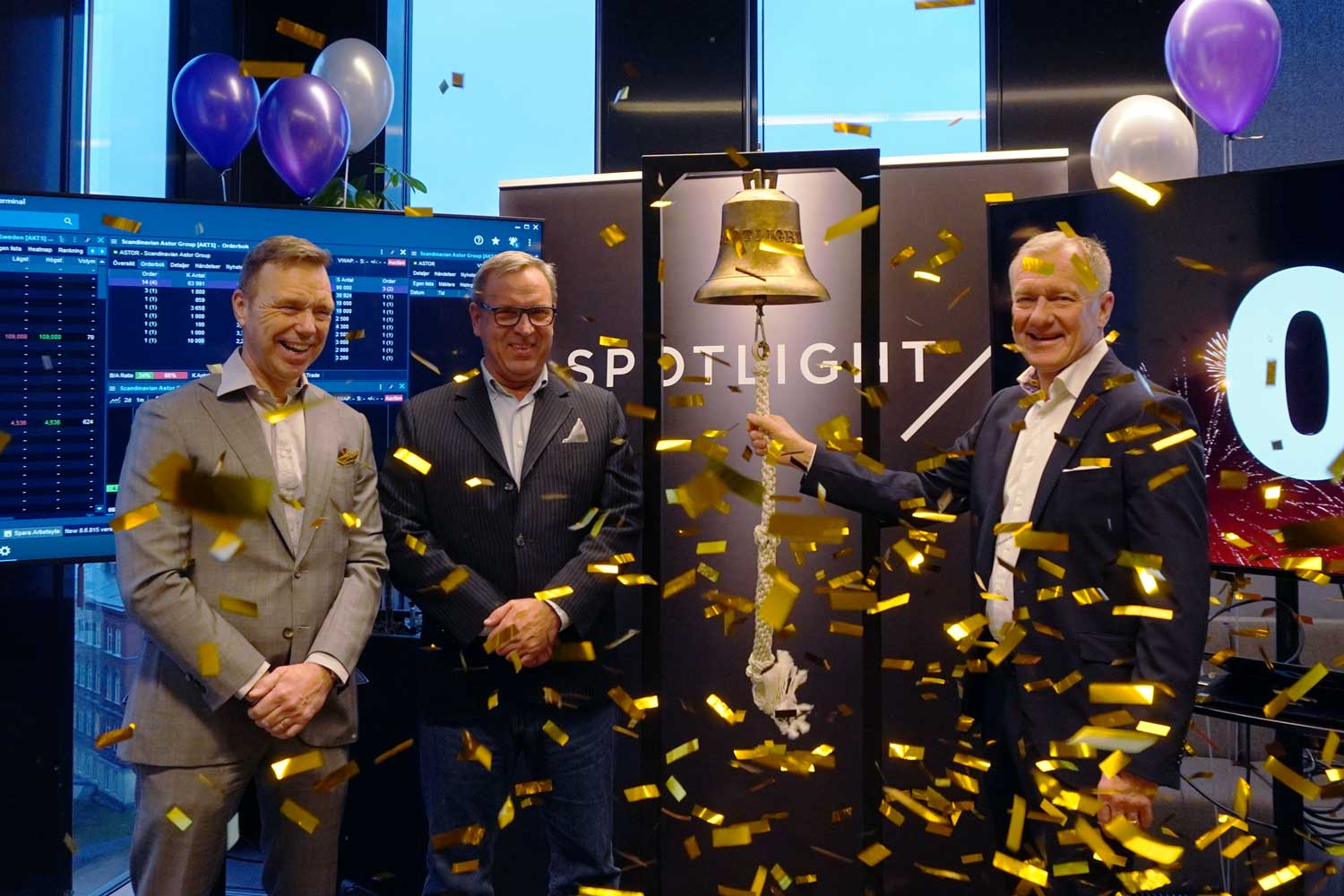 macbook pro on brown wooden table